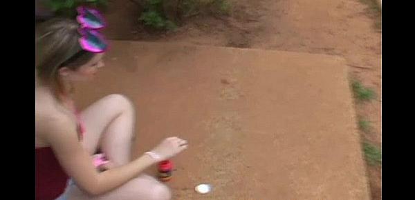  Kitty blowing bubbles in her miniskirt